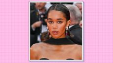 Laura Harrier wears a black dress and scarf as she attends the "Monster" red carpet during the 76th annual Cannes film festival at Palais des Festivals on May 17, 2023 in Cannes, France. / in a pink template