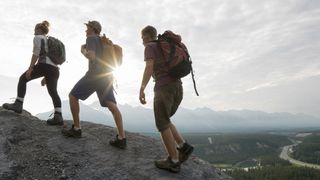 solo backpacking: a trio hiking on a ridge