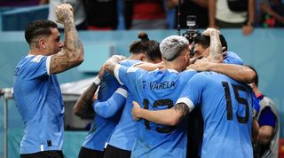 Uruguay celebrate one of their goals against Ghana at the 2022 World Cup in Qatar.