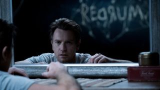 Ewan McGregor stares at a message in the mirror in Doctor Sleep.
