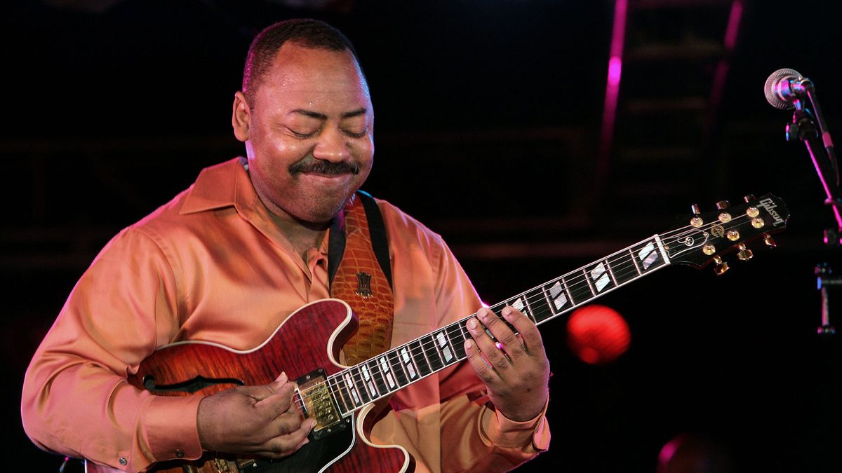 Paul Jackson Jr. playing his Gibson guitar onstage