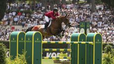 Karl Cook and Caracole De La Roque on their way to Rolex grand prix victory in Rome, at the opening leg of the new Rolex Series.