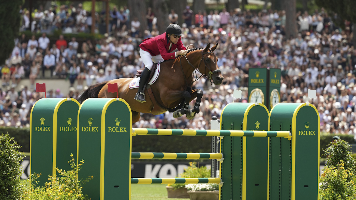 Karl Cook and Caracole De La Roque on their way to Rolex grand prix victory in Rome, at the opening leg of the new Rolex Series.