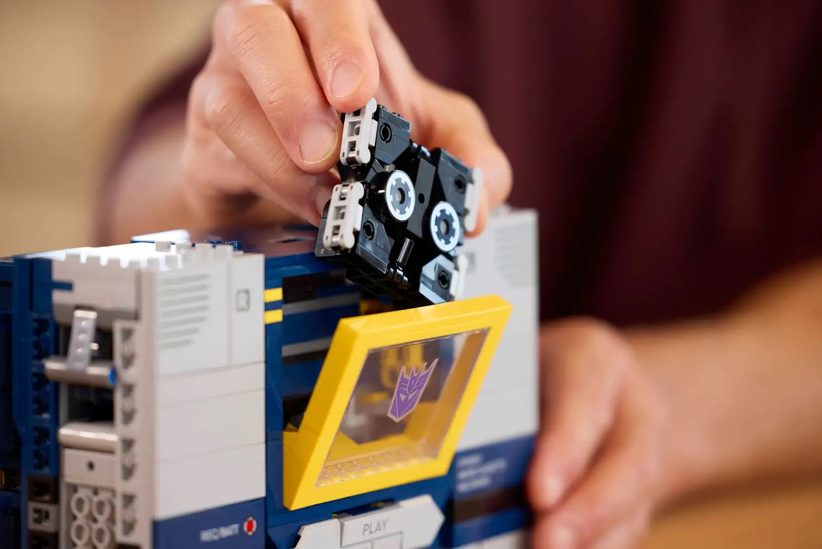 LEGO Transformers Soundwave having a cassette placed in