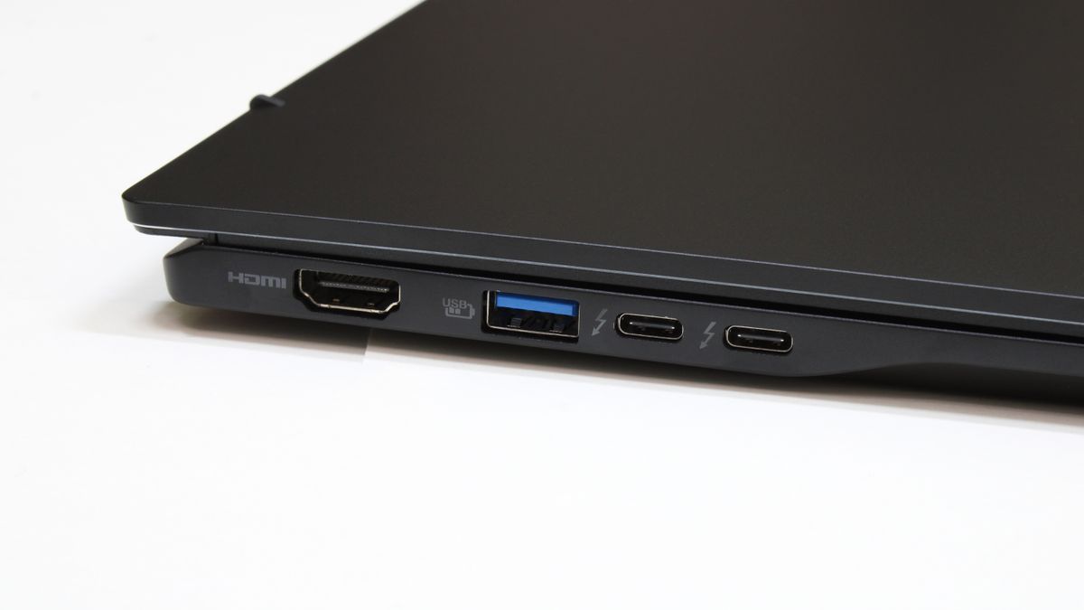 Acer Swift 16 AI (Intel) closed on a white surface showing the ports on its left side.