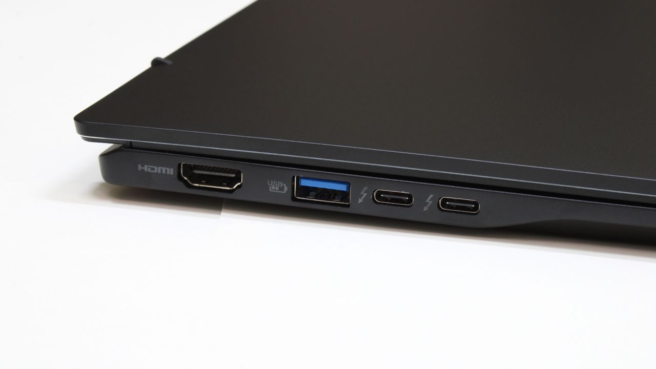 Acer Swift 16 AI (Intel) closed on a white surface showing the ports on its left side.