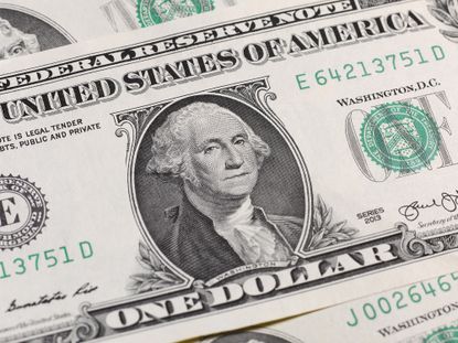 Angled view of Washington on dollar bill