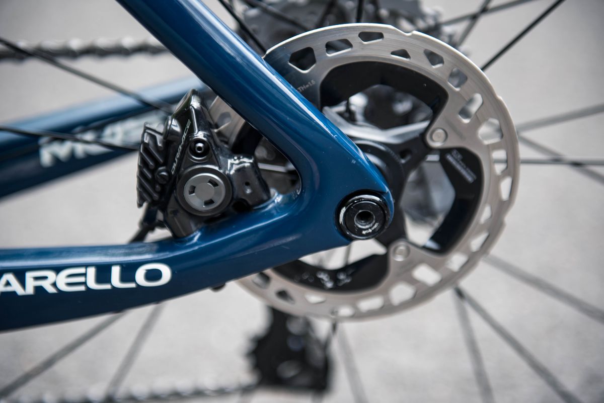 A close up of the rear disc brake on Michal Kwiatkowski's Pinarello Dogma F