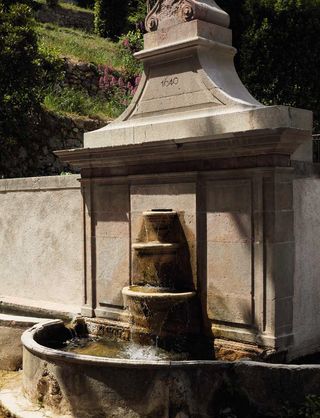17th century stone fountain on Louis Vuitton Grasse estate