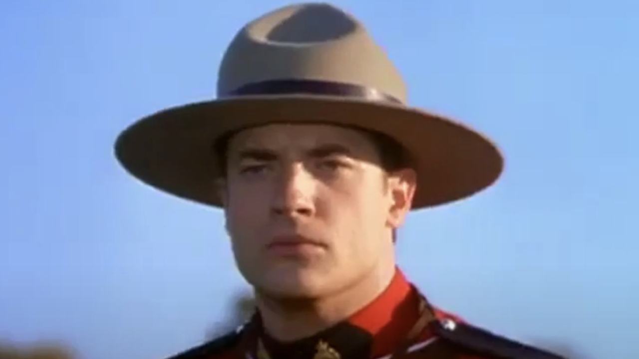 Brendan Fraser appearing vigilant in a mountie uniform in Dudley Do-Right