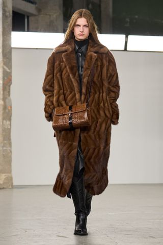 Gabriela Hearst model wears vintage mink coat