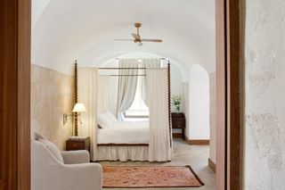 Cap Rocat hotel room with four poster bed