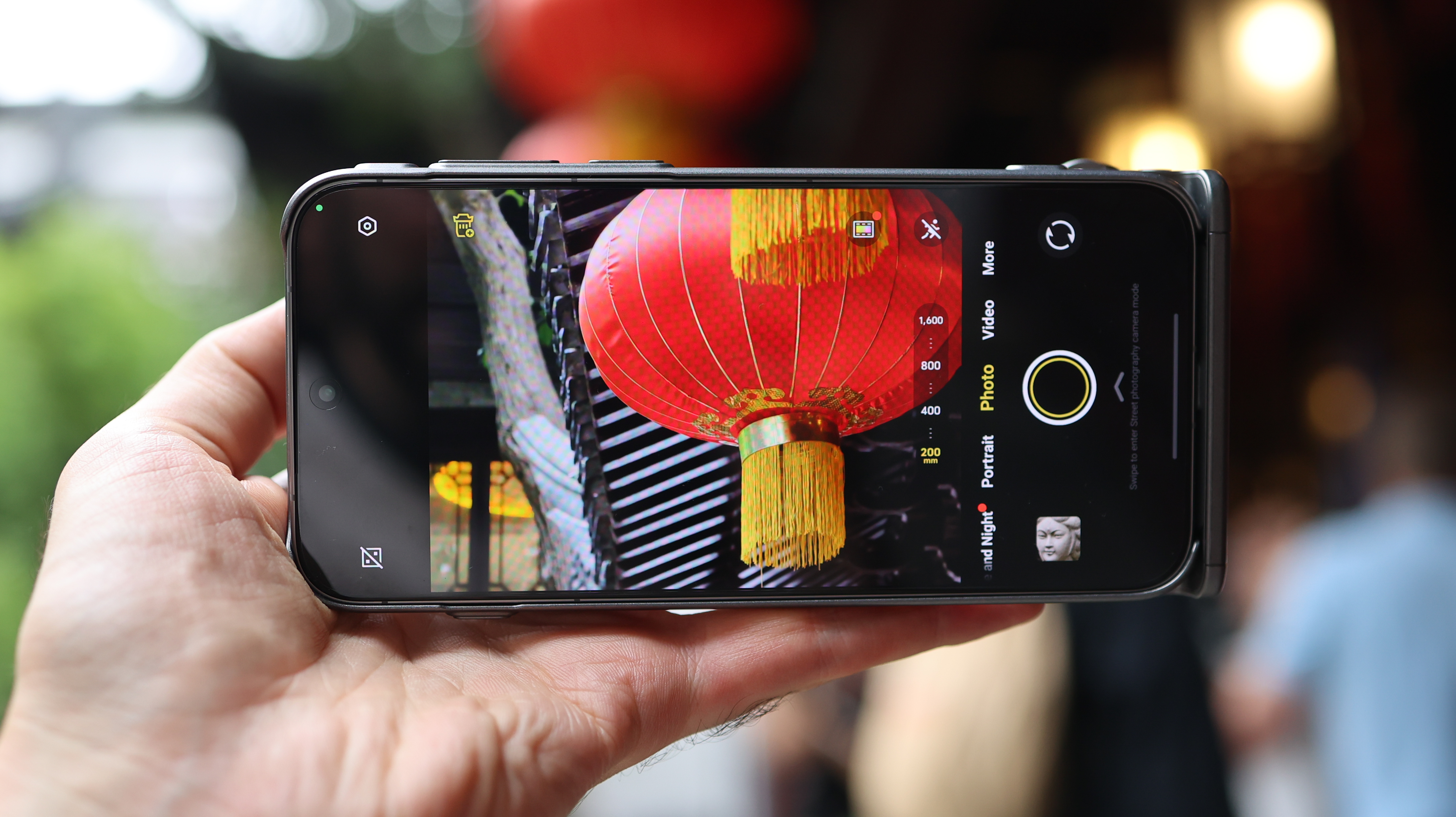 Vivo X300 Pro camera phone held in a hand