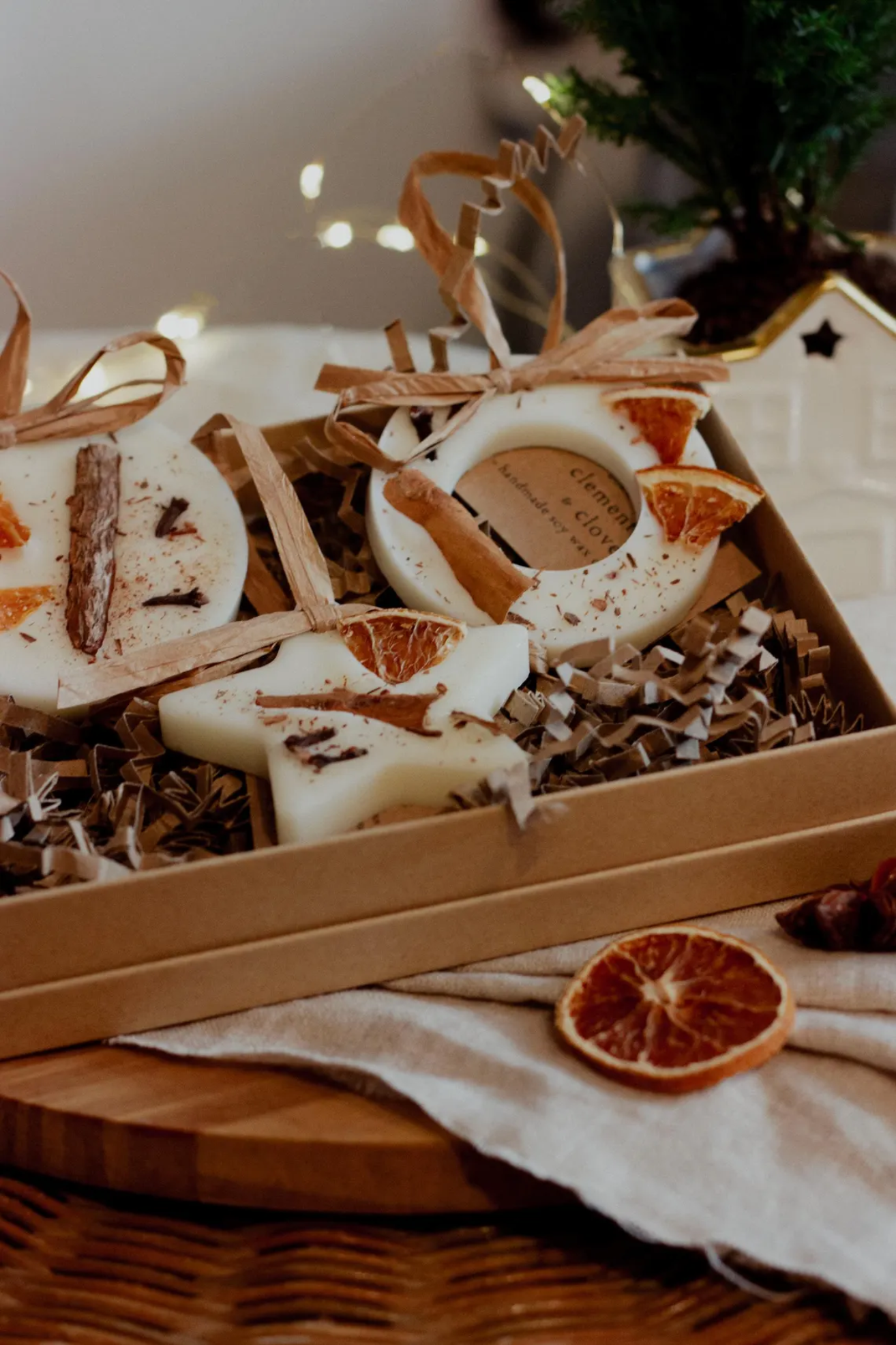 A set of three wax christmas ornaments in a box