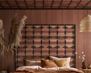 Brown metallic bedroom scheme with circle pattern repeat featured on alternative headboard and ceiling