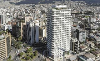 Busy aerial view of an area with lots of buildings