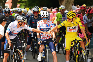 SAINT-PAUL-TROIS-CHATEAUX, FRANCE - JULY 17: (L-R) Remco Evenepoel of Belgium and Team Soudal Quick-Step - White best young jersey, Jonas Vingegaard Hansen of Denmark and Team Visma | Lease a Bike - Polka dot Mountain Jersey and Tadej Pogacar of Slovenia and UAE Team Emirates - Yellow Leader Jersey prior to the 111th Tour de France 2024, Stage 17 a 177.8km stage from Saint-Paul-Trois-Chateaux to Superdevoluy 1500m / #UCIWT / on July 17, 2024 in Saint-Paul-Trois-Chateaux, France. (Photo by Tim de Waele/Getty Images)
