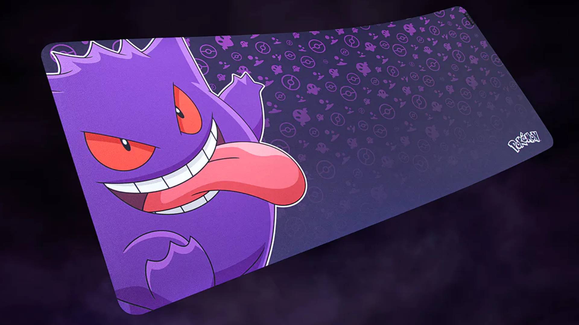 Image of a long purple mouse mat featuring the Pokemon Gengar, with a dark purple background behind it.