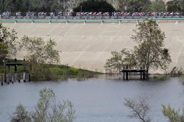 Riders cross over the Puddingstone Dam.