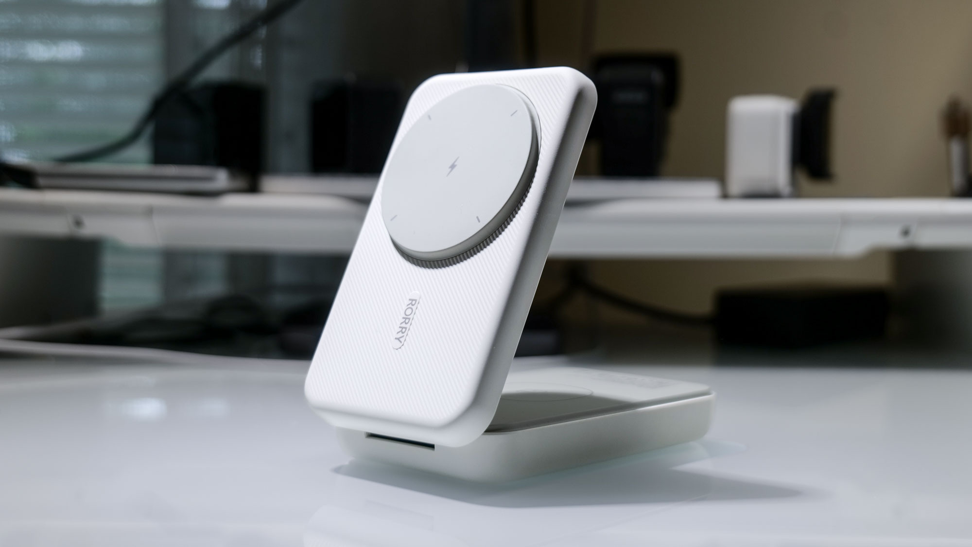 Rorry 3-in-1 Portable 10000 mAh Charger on desk.