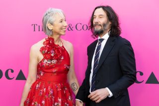 Keanu Reeves and Alexandra Grant on the red carpet