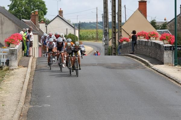 The break crosses a bridge during the fourth stage of the 2010 Route de France.