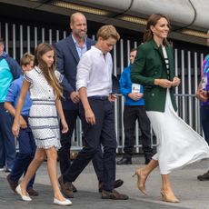 Princess Kate walking in front of Prince George, Prince William and Princess Charlotte 
