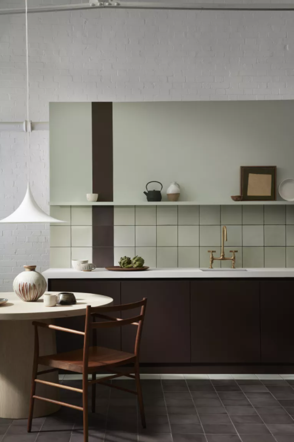 green and brown kitchen wooden round table, wood dining chair, pendant light, tiles