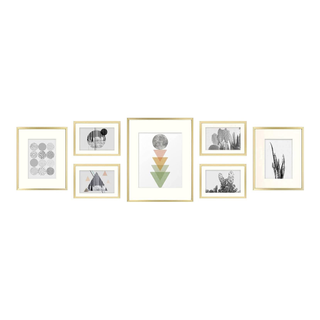 A set of 7 gold frames in assorted sizes