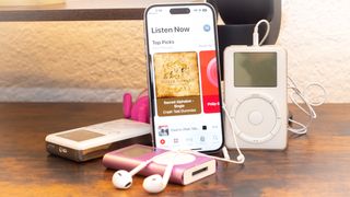 Apple iPhone 14 Pro with iPod classic and iPod mini pink