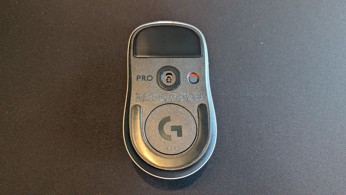 Underside of the Logitech G Pro X2 Superstrike pictured on a black mouse mat.