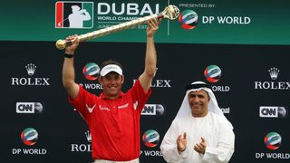 Lee Westwood with the Dubai World Championship trophy