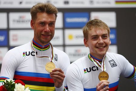 Roger Kluge and Theo Reinhardt of Germany celebrate winning the gold medal in the Men's Madison on day five of the UCI Track Cycling World Championships