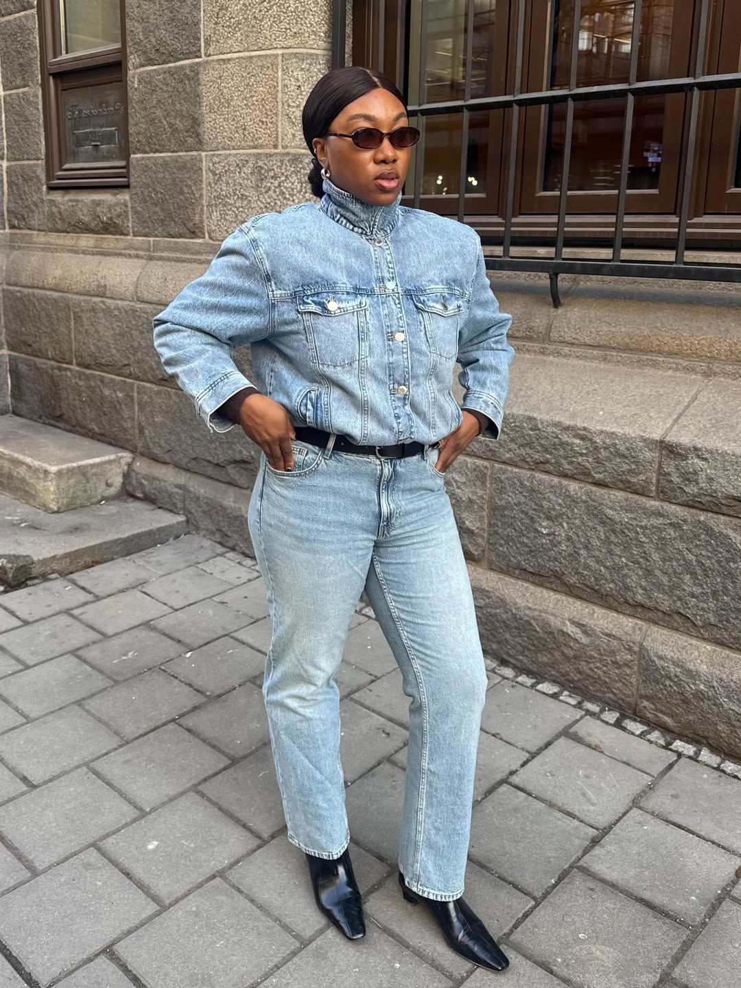 Nnenna Echem in light-wash jeans