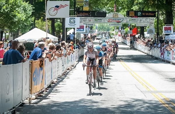 The race passes through the downtown start-finish for another lap.