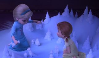 Anna and Elsa playing in the snow