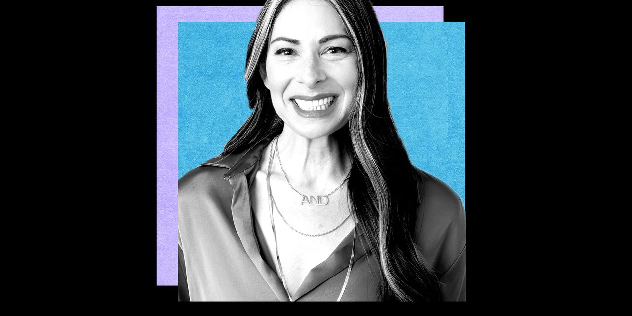 headshot of stacy london in black and white overlaid on blue background for she pivots podcast