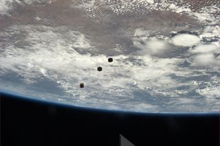 Mastracchio Snaps Spectacular Photo of Satellites After Deployment from ISS