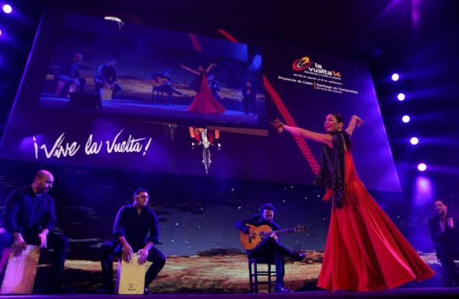 A flamenco dancer and musicians perform during the presentation of the 2014 Vuelta a Espa&ntilde;a route