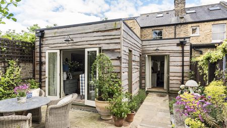 timber clad rear extension on a Victorian house