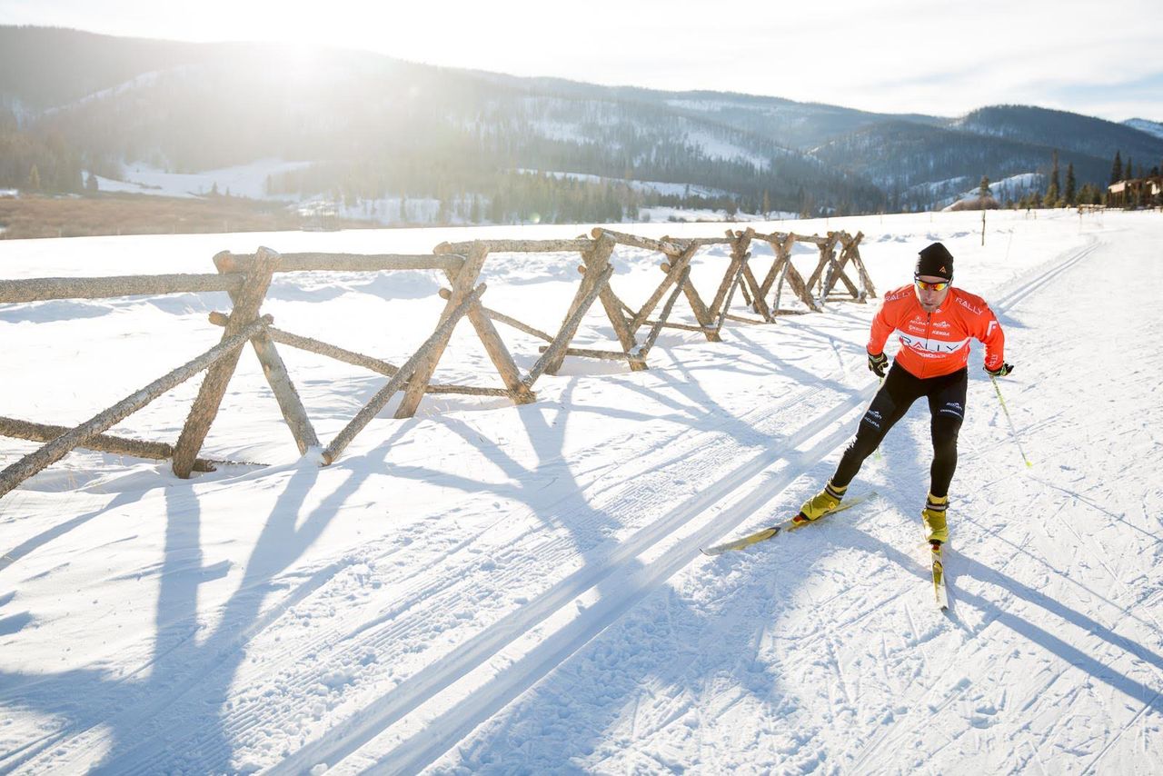 Rally Cycling Team Director Eric Wohlberg shows the team proper skate skiing technique.