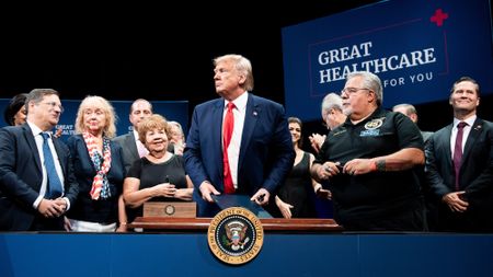 US President Donald Trump signs executive order regarding Medicare at Sharon L. Morse Performing Arts Center October 3, 2019, in The Villages, Florida