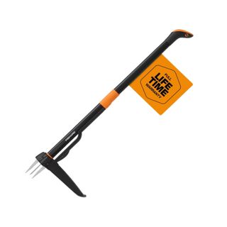 A black weed puller with a spiked head and an orange label on it