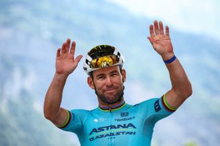 Astana Qazaqstan Team's British rider Mark Cavendish waves as he awaits the start of the 5th stage of the 111th edition of the Tour de France cycling race, 177,5 km between Saint-Jean-de-Maurienne and Saint-Vulbas, on July 3, 2024. (Photo by Anne-Christine POUJOULAT / AFP) (Photo by ANNE-CHRISTINE POUJOULAT/AFP via Getty Images)