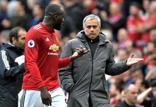 Romelu Lukaku of Manchester United speaks with Jose Mourinho during the Premier League match between Manchester United and Liverpool at Old Trafford on March 10, 2018 in Manchester, England. (Photo by Michael Regan/Getty Images)
