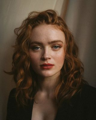 An image of Sadie Sink with copper hair.