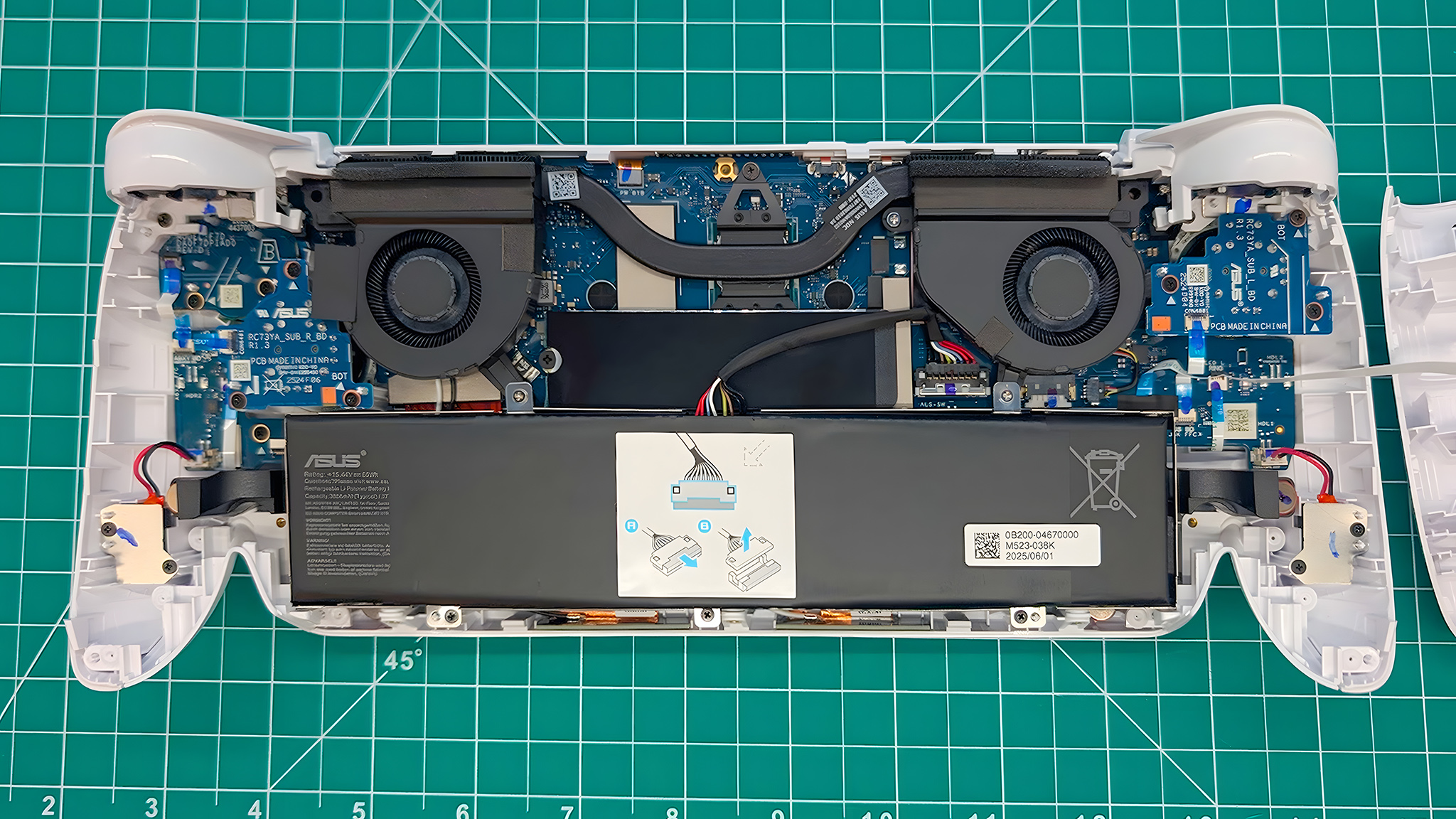 A picture of the Xbox Ally with its back casing off.