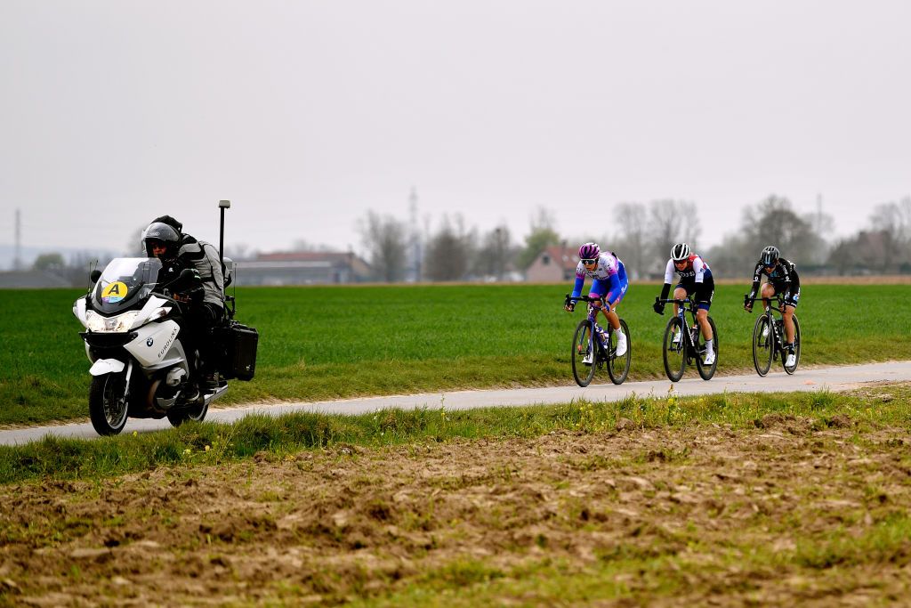 WAREGEM BELGIUM MARCH 30 A general view of Georgia Baker of Australia and Team BikeExchange Jayco Brodie Chapman of Australia and Team FDJ Nouvelle Aquitaine Futuroscope and Juliette Labous of France and Team DSM compete in the breakaway during the 10th Dwars door Vlaanderen 2022 Womens Elite a 120km one day race from Waregem to Waregem DDV22 DDVwomen on March 30 2022 in Waregem Belgium Photo by Luc ClaessenGetty Images