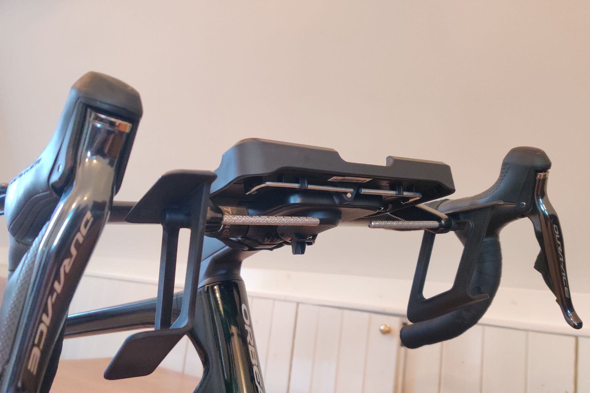 Image shows a rider using Wahoo's new Kickr Steer on the updated RGT cycling platform