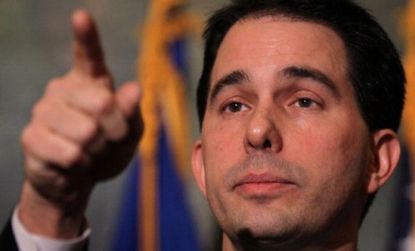 The bitter battle between Gov. Scott Walker (R-Wis.) and labor unions has translated into a sharp rise in his disapproval rating, according to new polls.